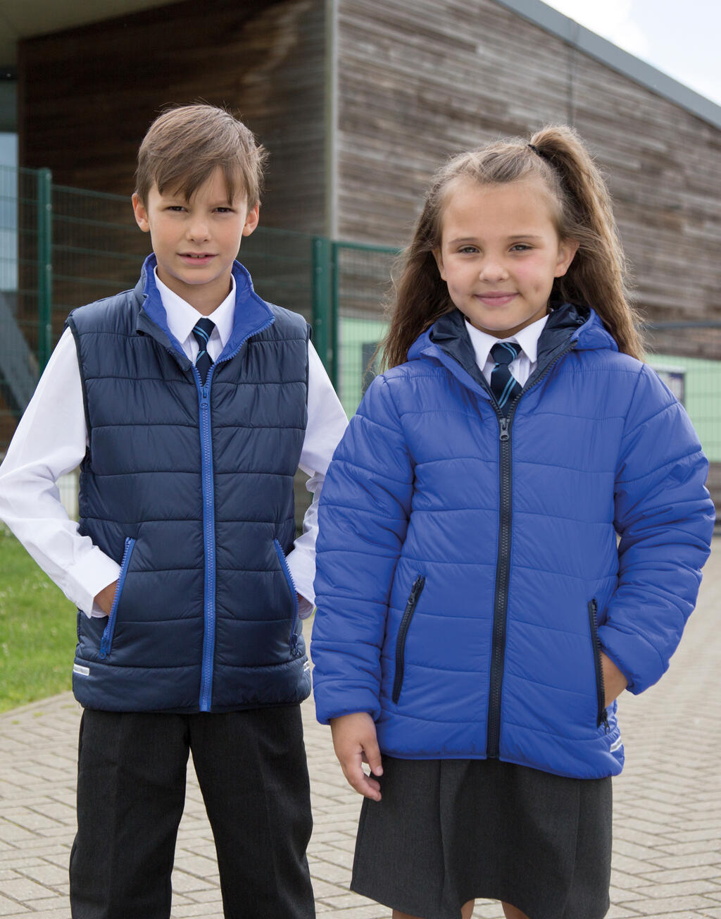  Junior/Youth Padded Bodywarmer in Farbe Black/Orange